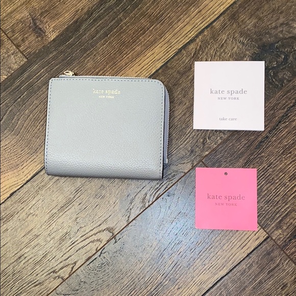 kate spade Handbags - Kate Spade True Taupe Small Bifold Wallet